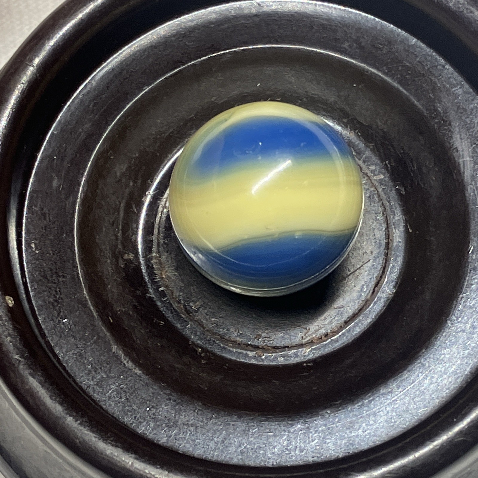 Vintage Akro Agate Corkscrew swirl banana yellow ocean blue glass marble wet