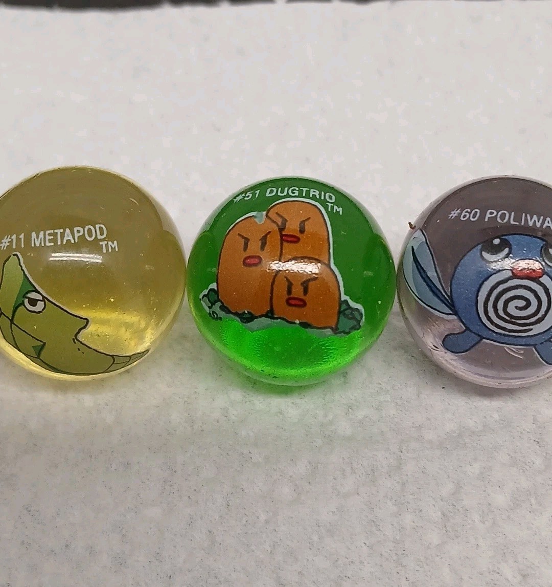 NINTENDO 1999/2000 Pokemon Marble Lot of 9 Marbles With A #68 MACHAMP Bag RARE