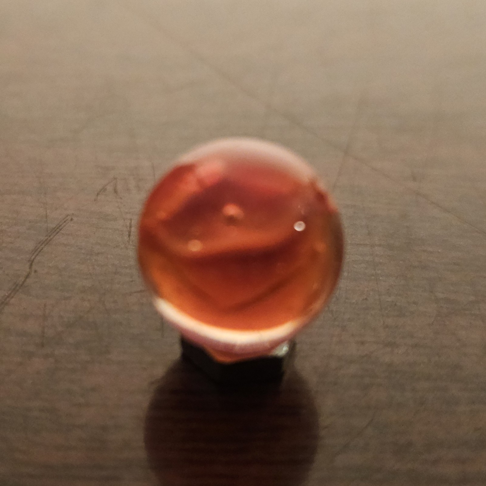 C E Bogard Orange 4- Lobe Floppy Cats Eye Clear Glass .593 Marble