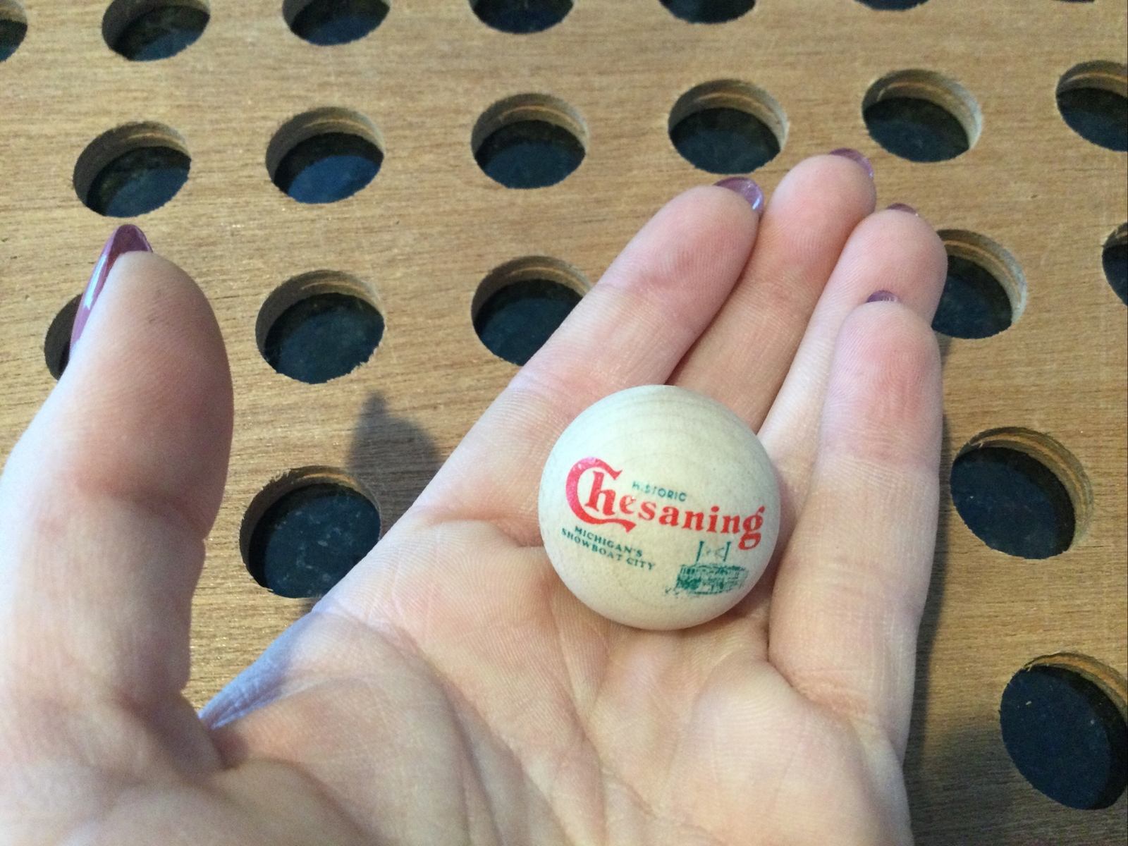 Vintage | “Chesaning Michigan’s Showboat City” Marble | Wood, Red, & Green