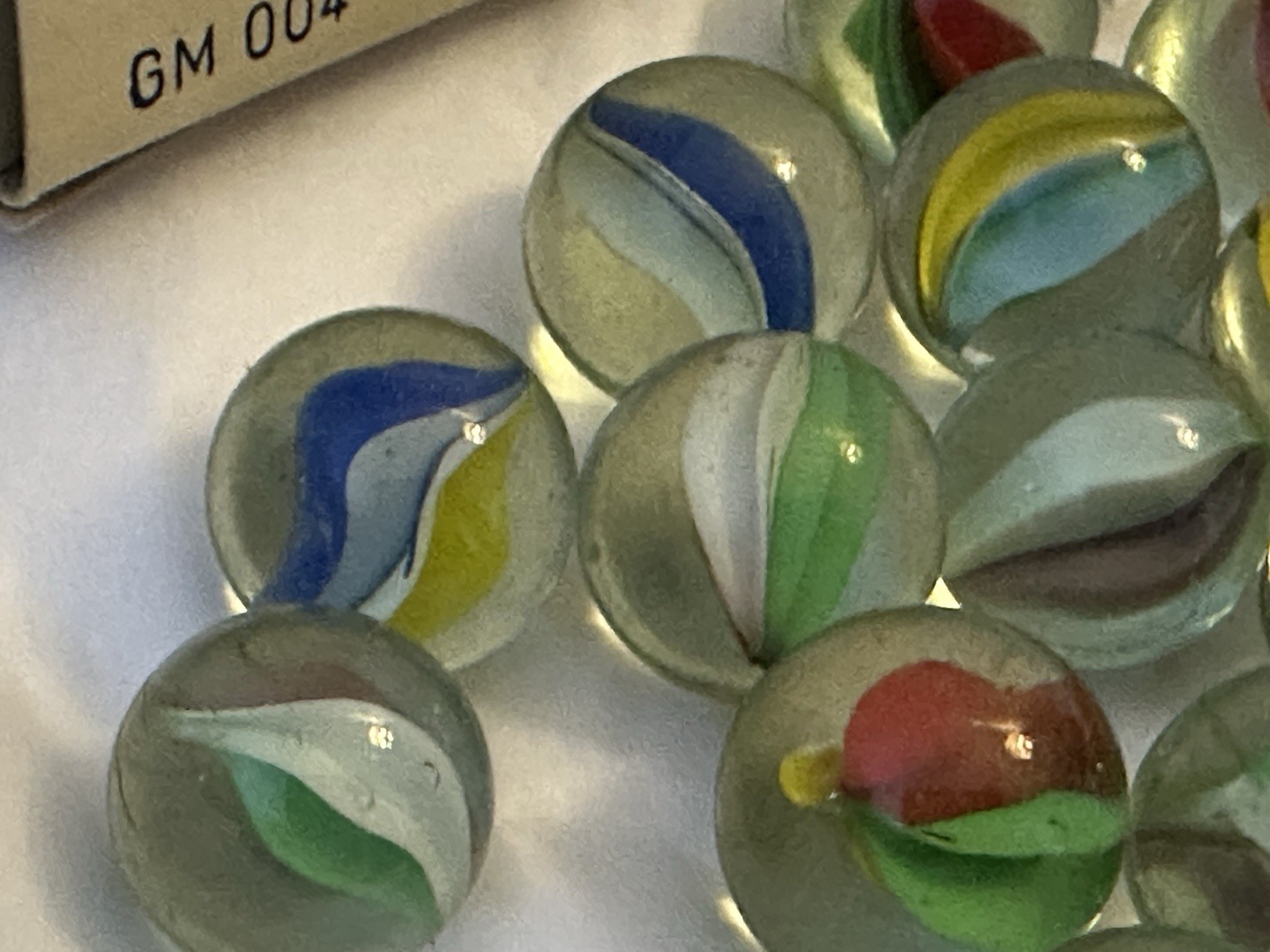 Vtg glass marbles 1”. gm-004 Shooters. 25 count in box. Color Cat-eyes. NIB