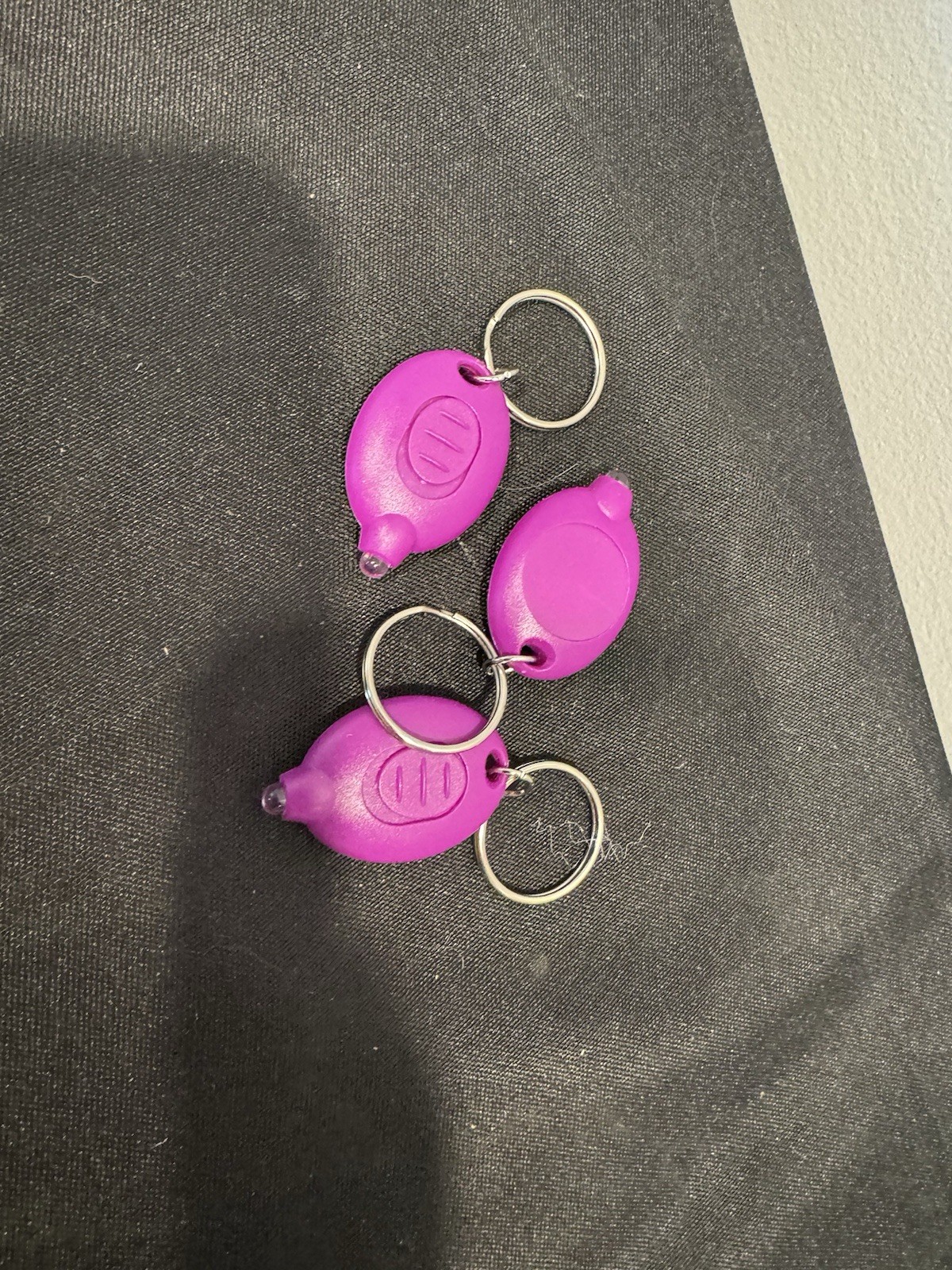 3 Blacklight Key Chains With On And Off Switch