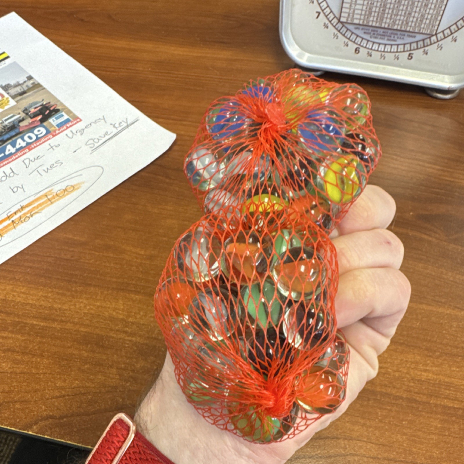 2 bags of Marbles in Red Mesh Bags roughly 3/4 pounds