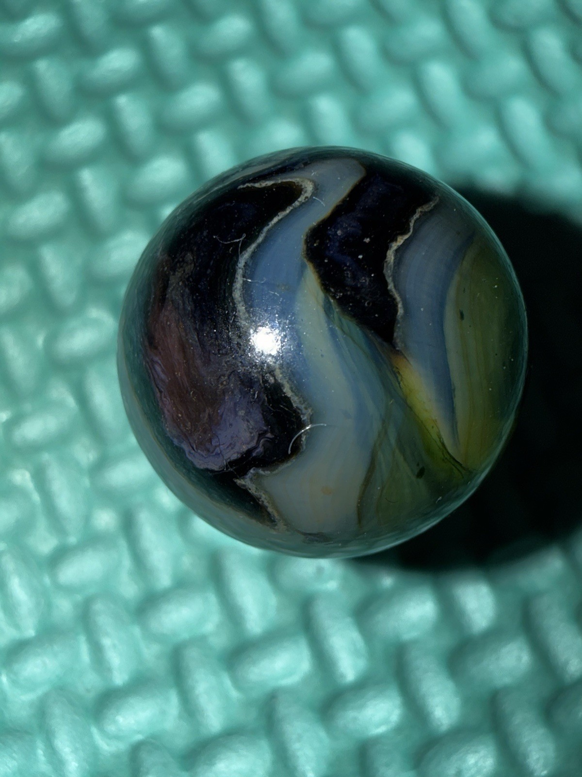One (1) 2008 JABO Peltier Mansion Run .62 Silver Strike Marble