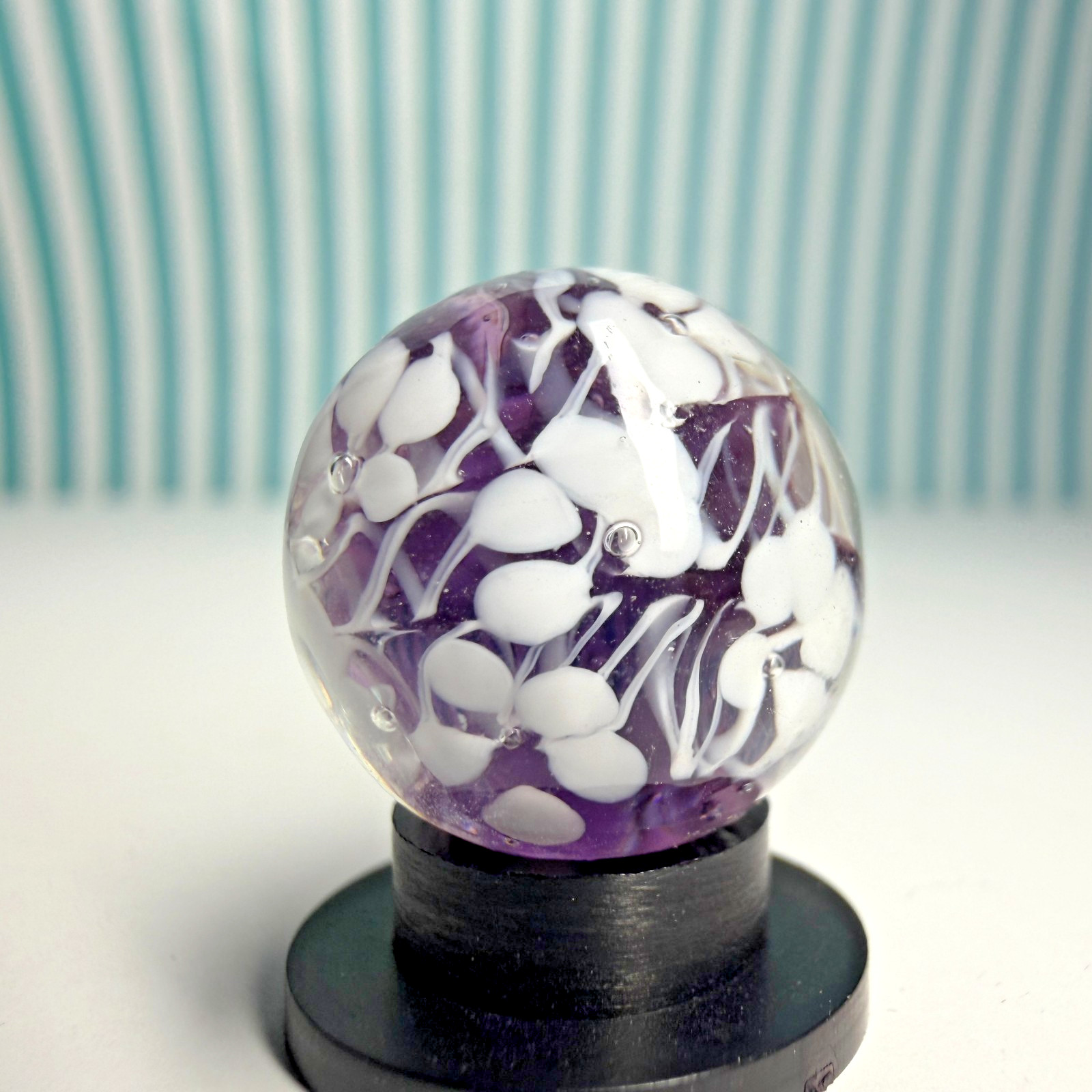 Sweet Ditsy Marble 5/8″ Handmade Glass White Flower Purple Base + Stand