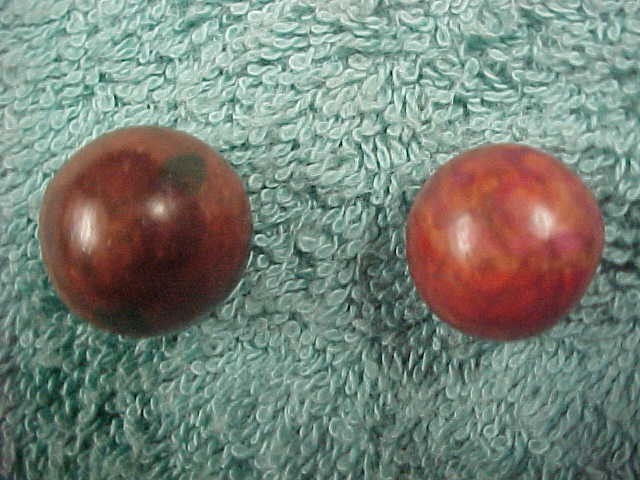 set of 2 hand painted clay marbles glazed.Beautiful.Hard to find