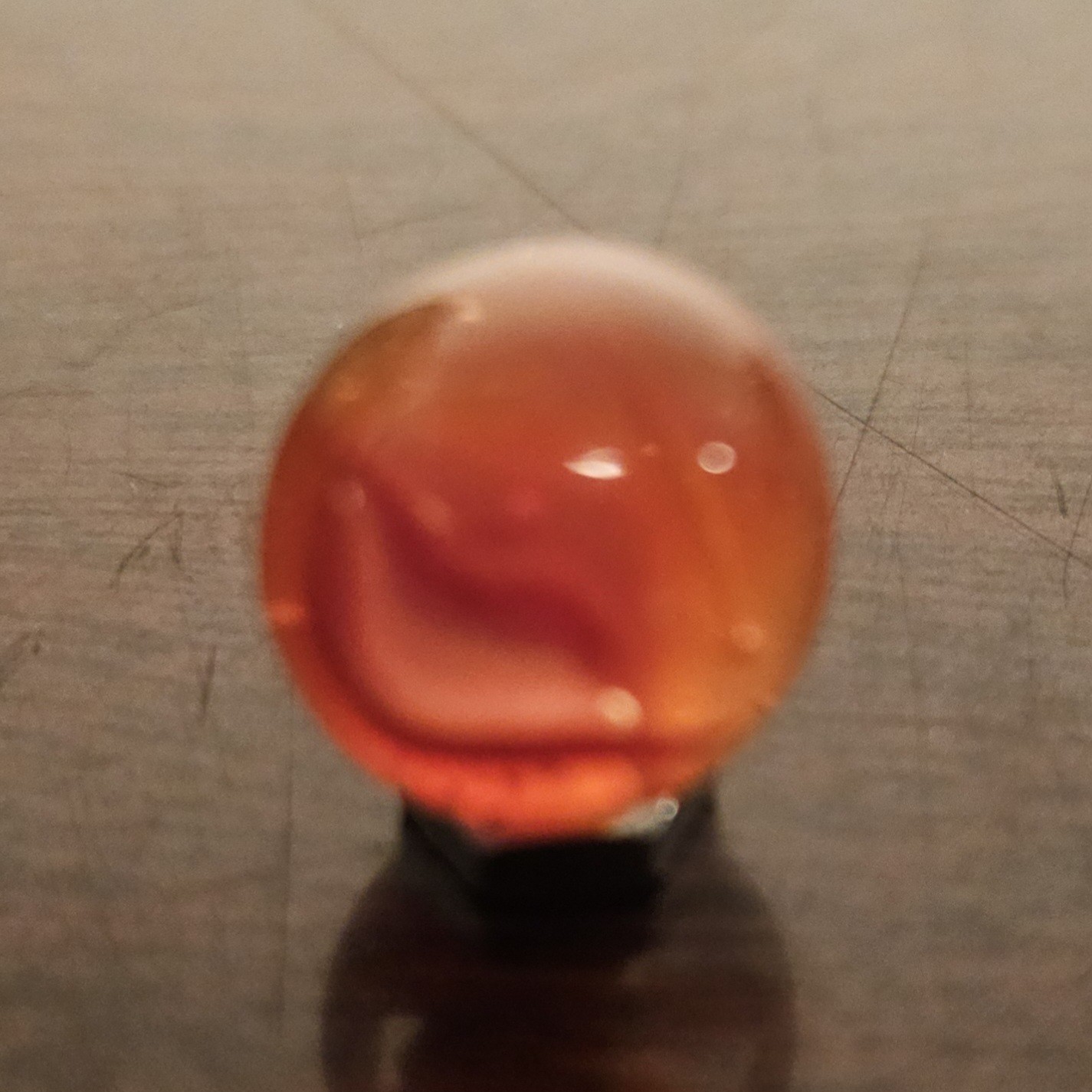 C E Bogard Orange 4- Lobe Floppy Cats Eye Clear Glass .593 Marble