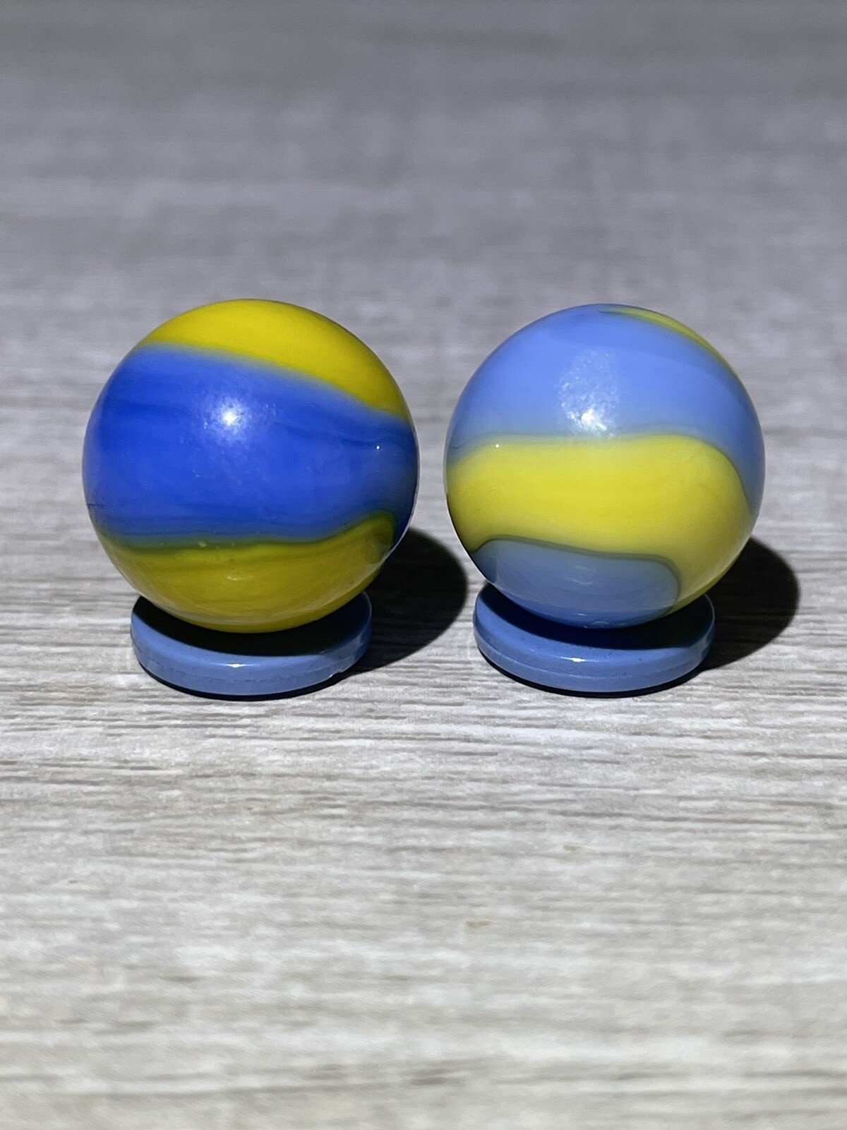 Two Akro Agate Cub Scout Corkscrews Vintage Marbles