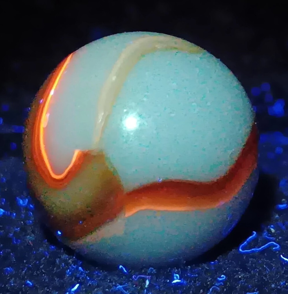 Vintage Peltier Glass NLR Hybrid Oxblood Marble. .60″ Mint. (HTF) UV Active