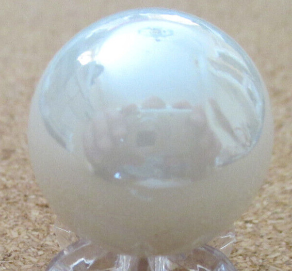 NFL: New England Patriots Logo on a Pearl Jabo Marble #111 .987″ = 25.06mm