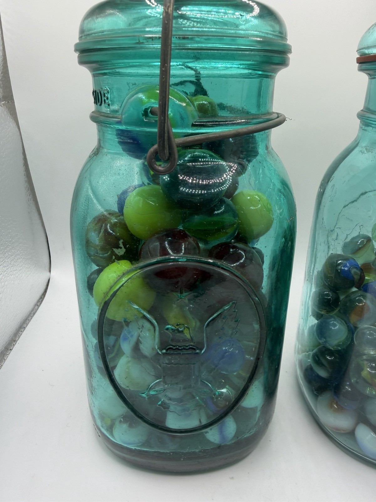 Marbles 4 Pounds Of Miscellaneous Lot In Blue Mason Jars Mixed sizes and colors