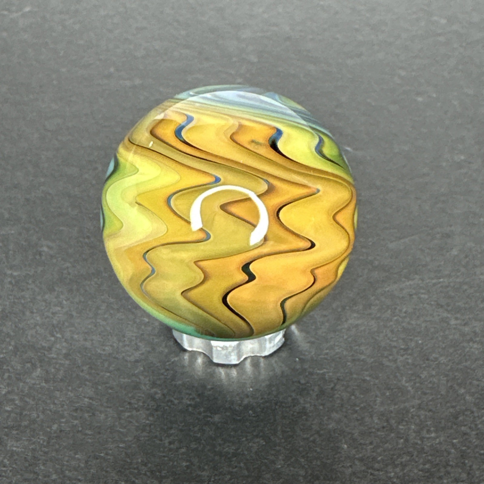 Contemporary Art Glass Marble 1.08″ Wavy Fumed Wigwag W/ UV Reactive Green Glow