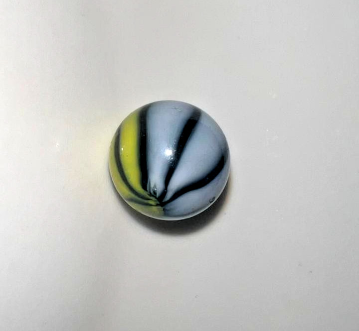 21 vintage handmade glass marbles with colorful swirls and unique patterns.