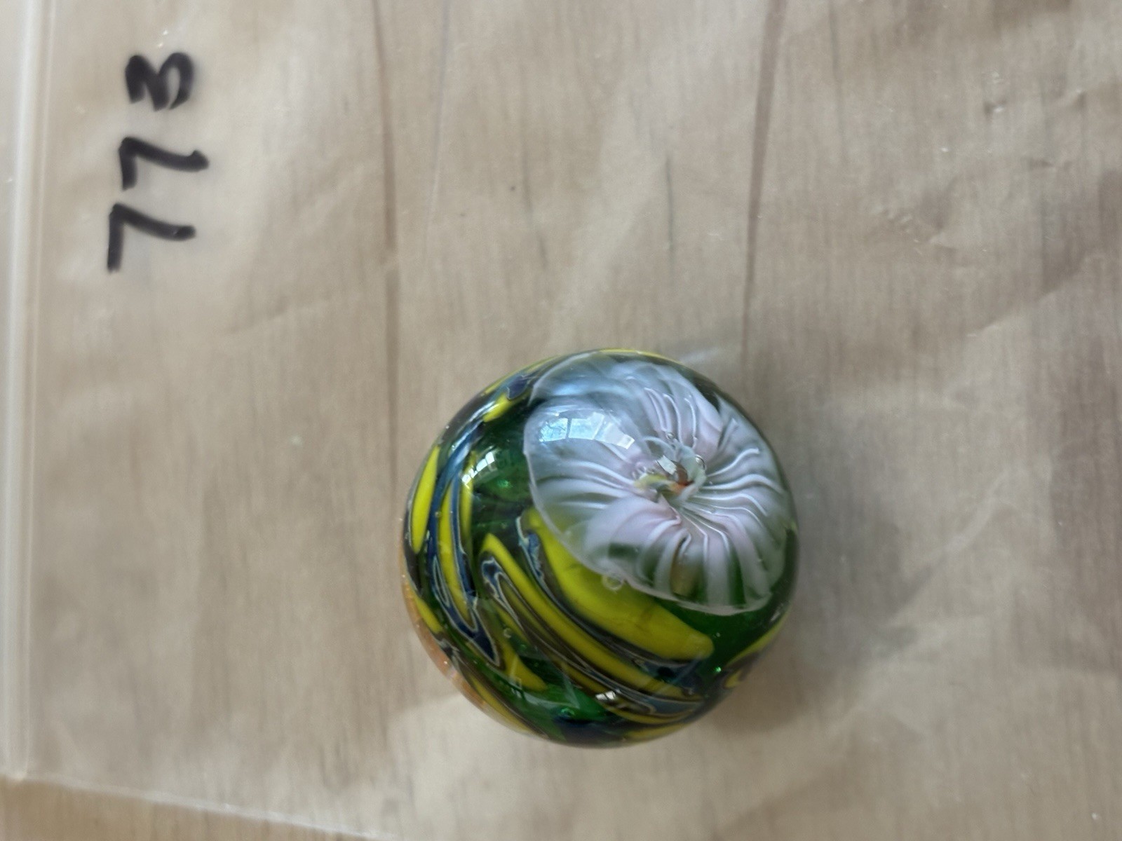 handmade art glass marble “Bi Polar Number 773”” By Sara Sally LaGrand