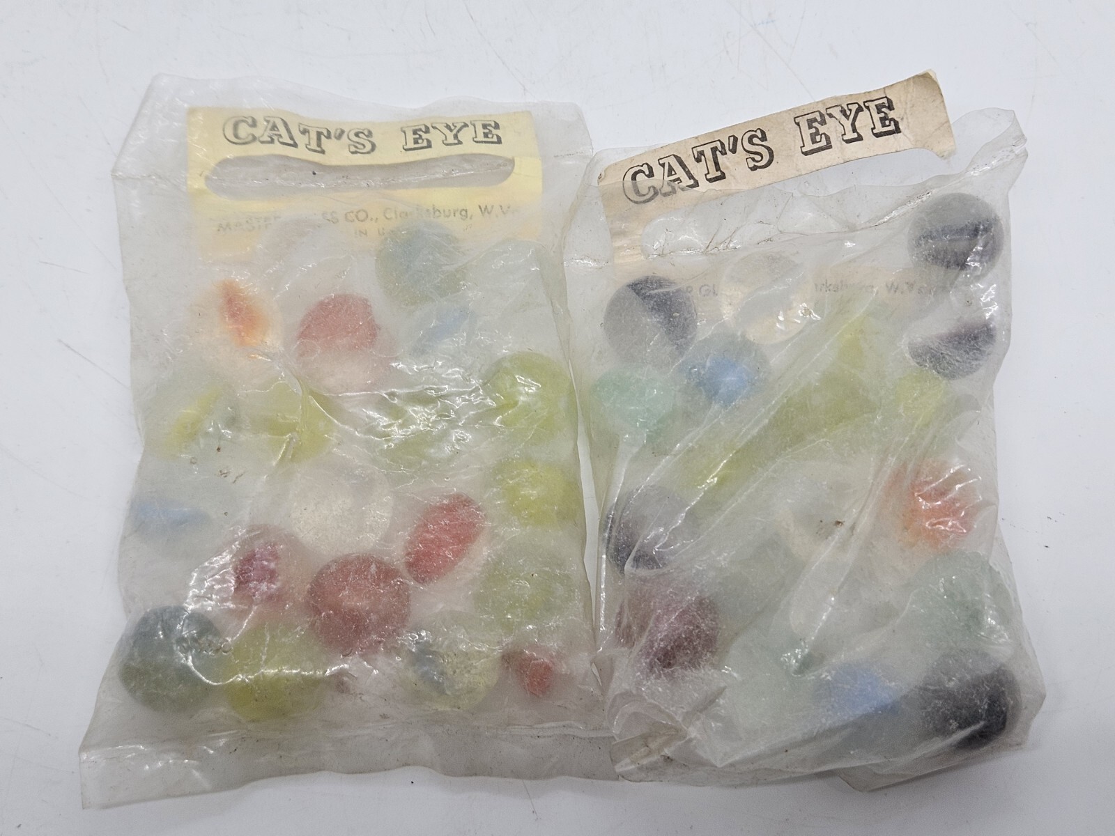 Antique 2 NOS “Cat’s Eye” Marbles Marble Bags Master Glass Co. Clarksburg W. VA.