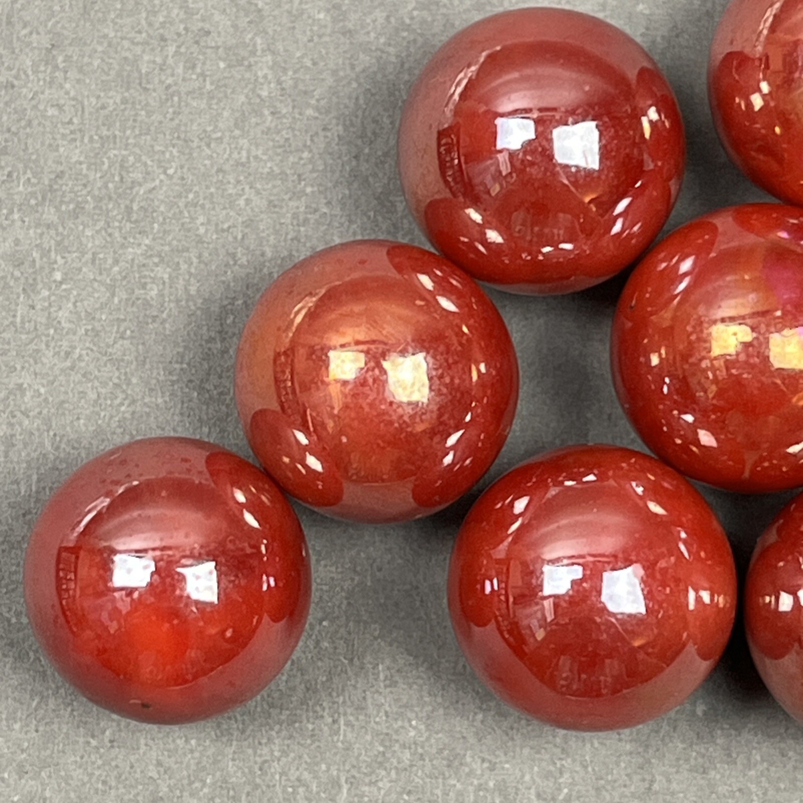 Vintage Lot – (9) Glass Marbles Opaque Orange / Red Fire Iridescent Swirl – 1/2”