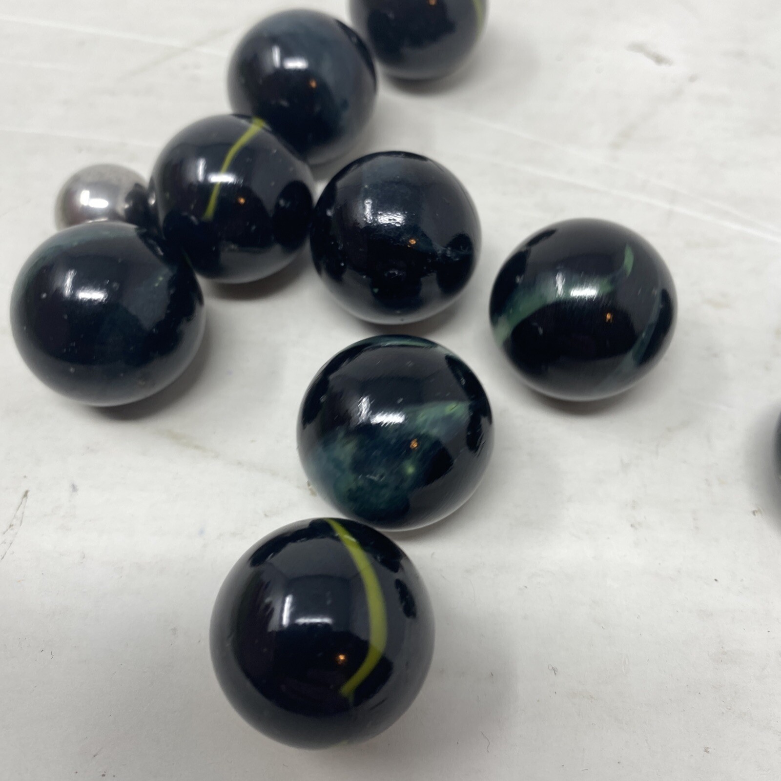 Lot Of 11 Vintage Marbles Black With Green/Yellow Color Swirl