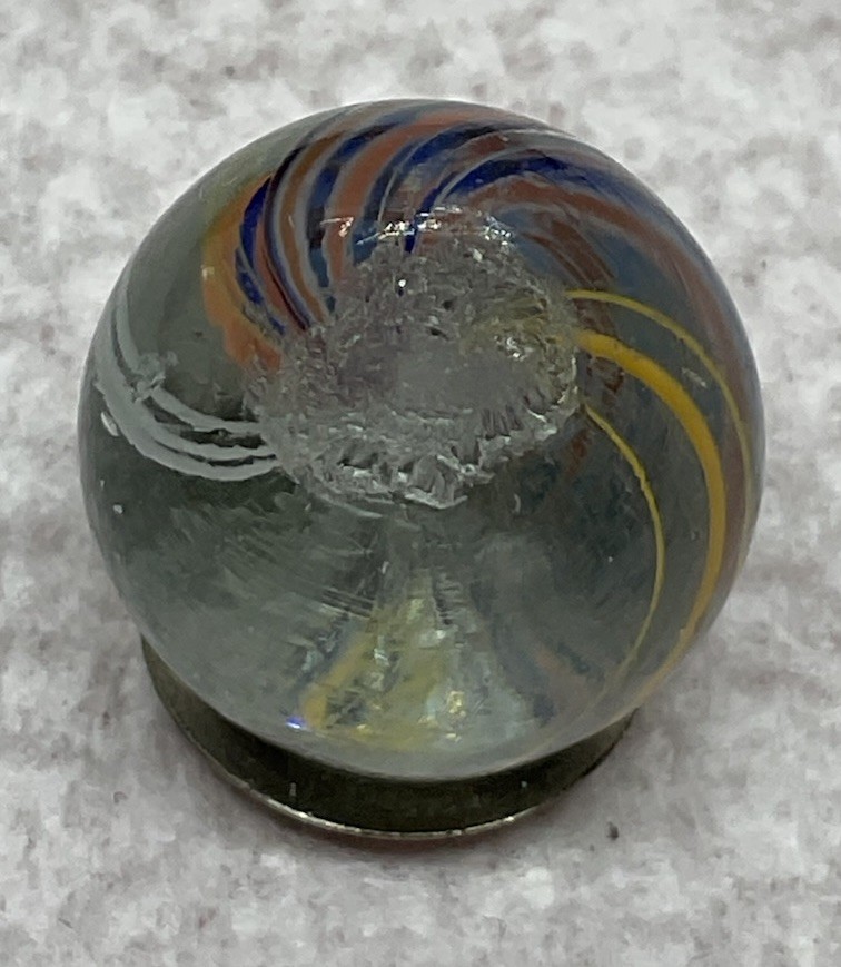 A Vintage German Handmade Core Less Swirl. Measures .68” In Mint Condition