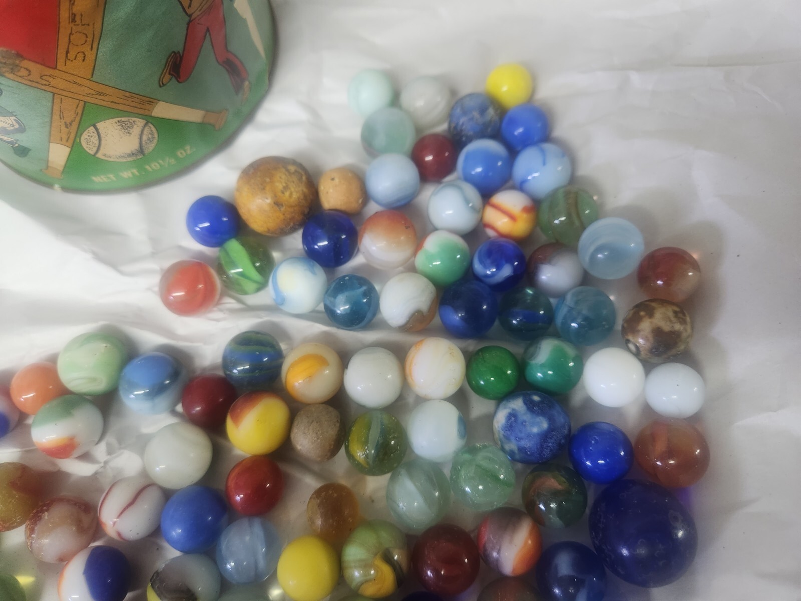 Lot of 130 vintage marbles in vintage Cherrydale Farms peanut Crunch 1950s Can.