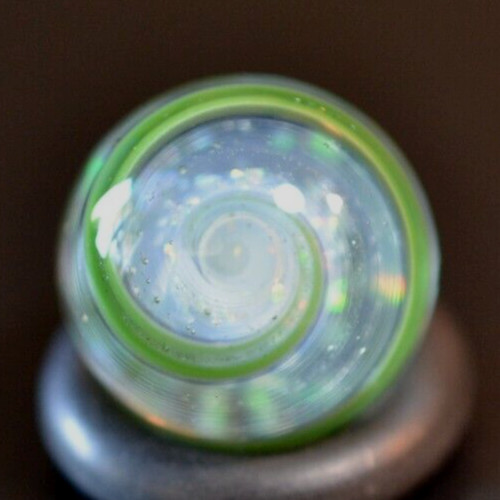 BRYAN TRILLAS GLASS MARBLE/.560″-WHITE & DICHROIC CORE W/BLACK& GREEN BLACKLIGHT