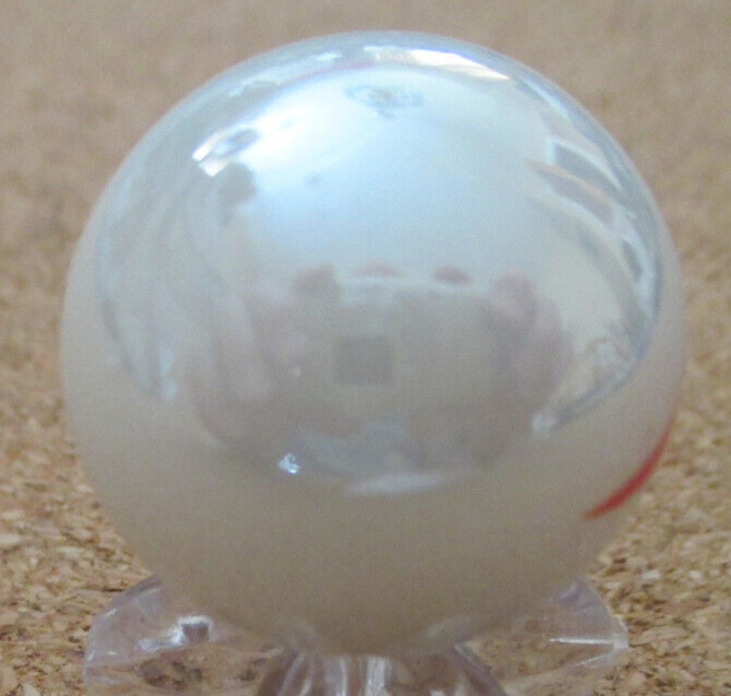 NFL: New England Patriots Logo on a Pearl Jabo Marble #111 .987″ = 25.06mm