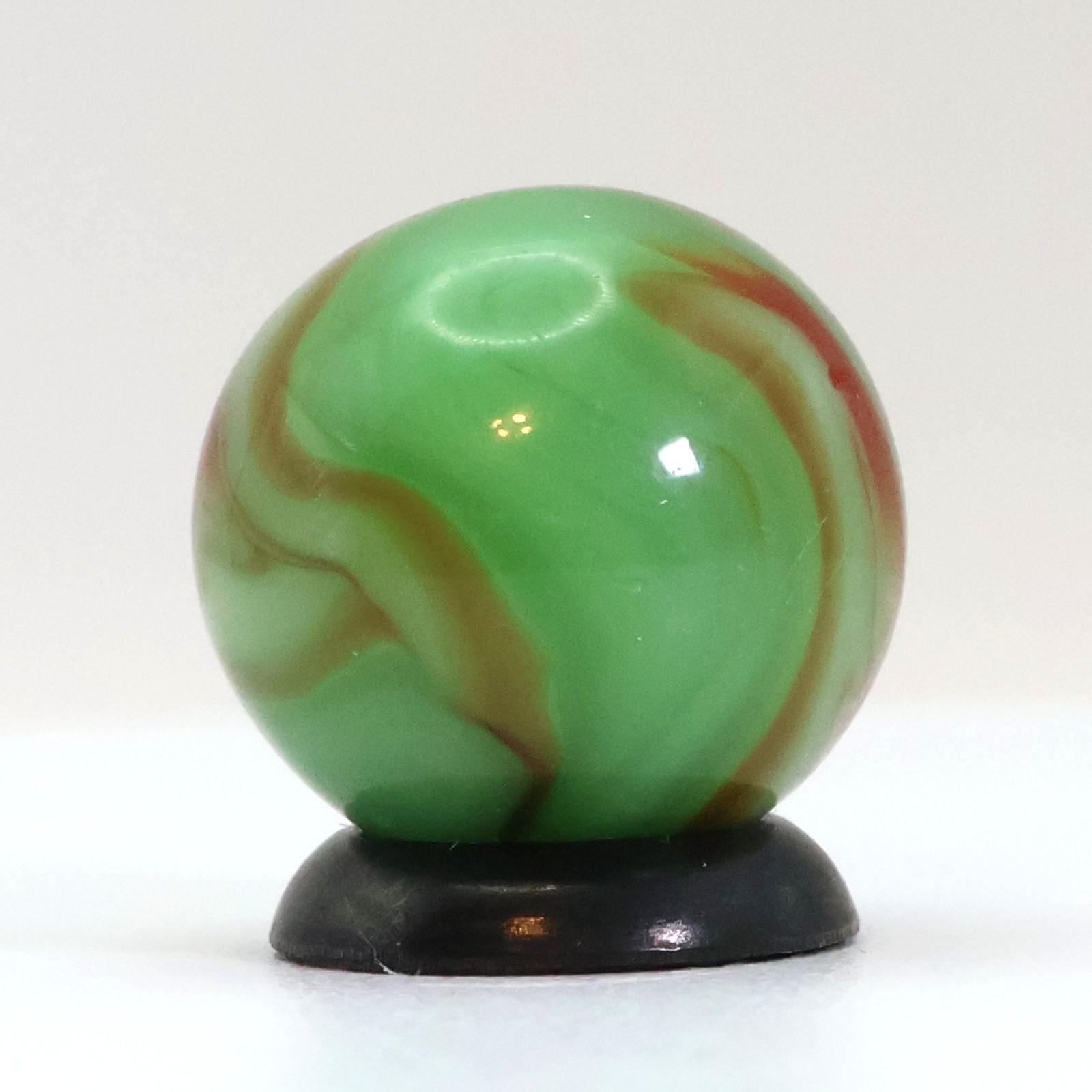 5/8″ Swirl Marble Green Base with Tan & Red Ribbons M-