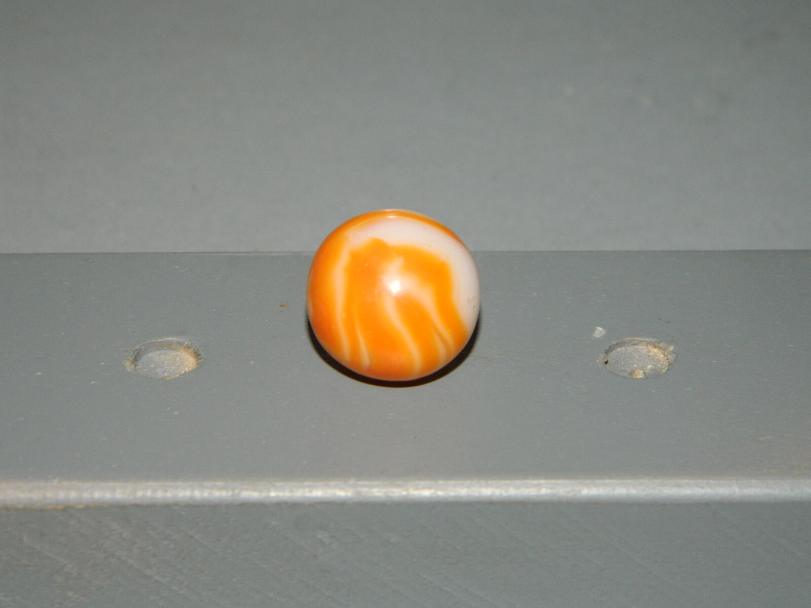 Vintage West Virginia Swirl White Base Orange Swirl approx 5/8+”