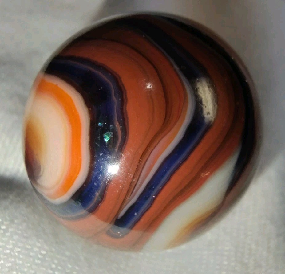 Jabo/DAS Cranberry Busy Gorgeous Flame Swirl Shooter Marble .74 Out Of Round