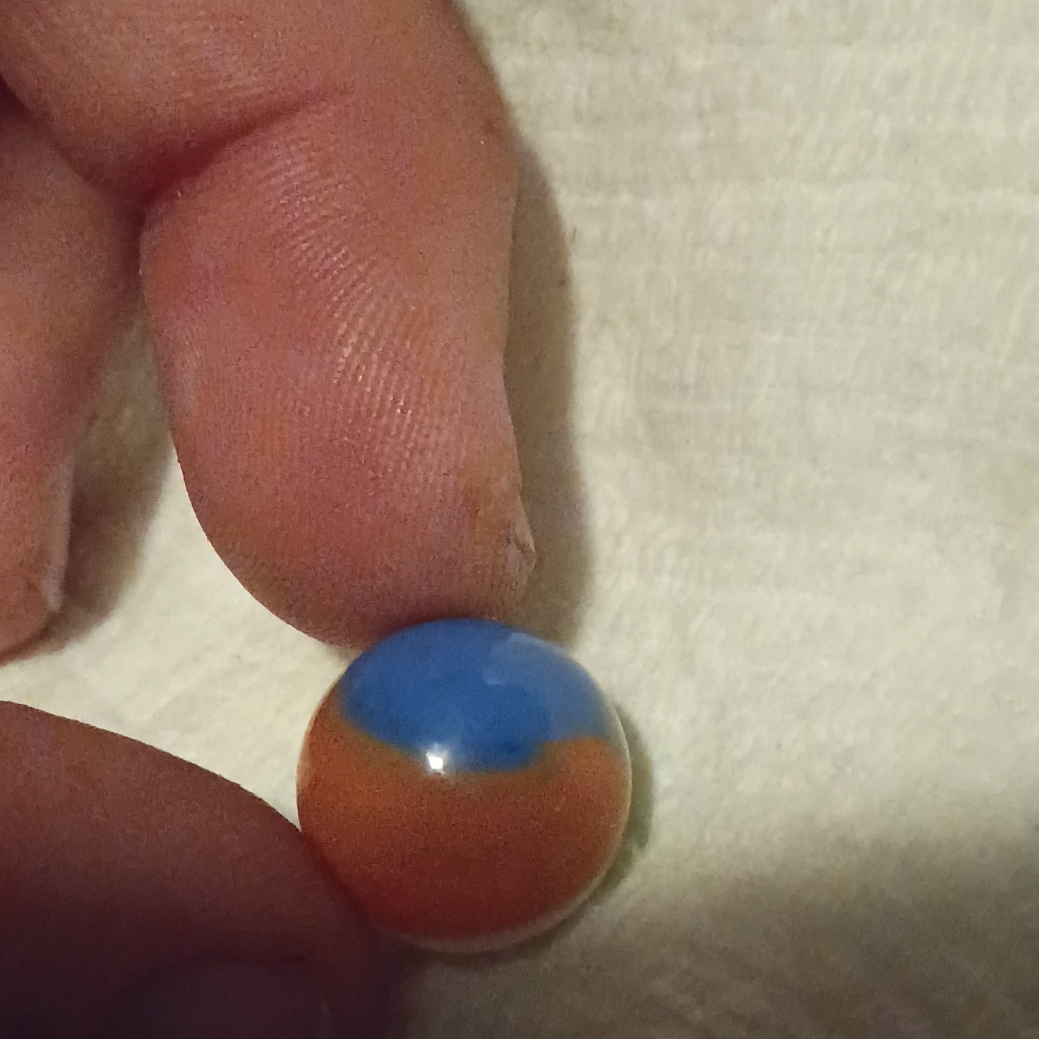beach ball marble colorful orange blue green white and yellow