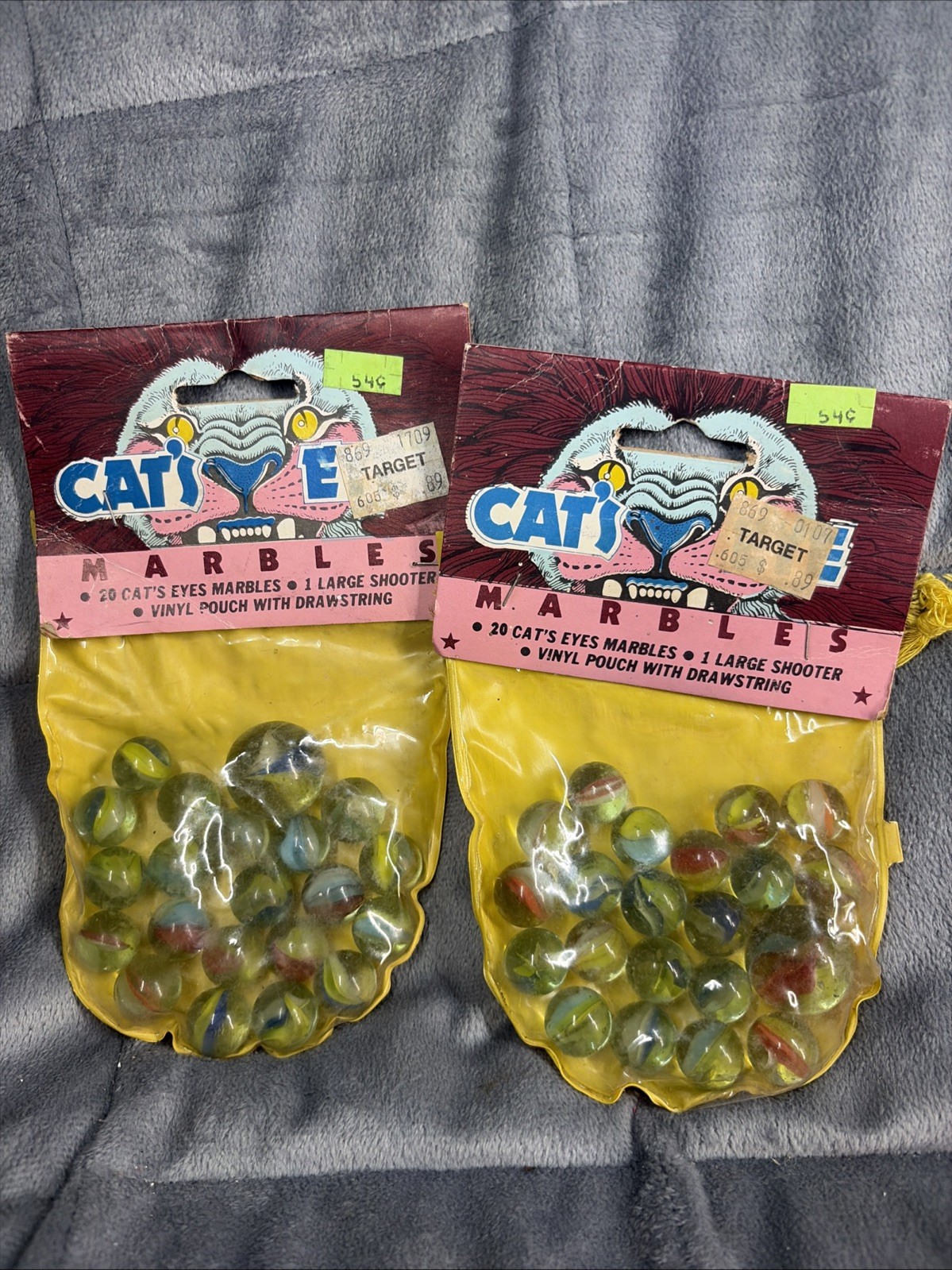 Larami Vintage 20 cat’s eye marbles & 1 large shooter & vinyl pouch. New Sealed