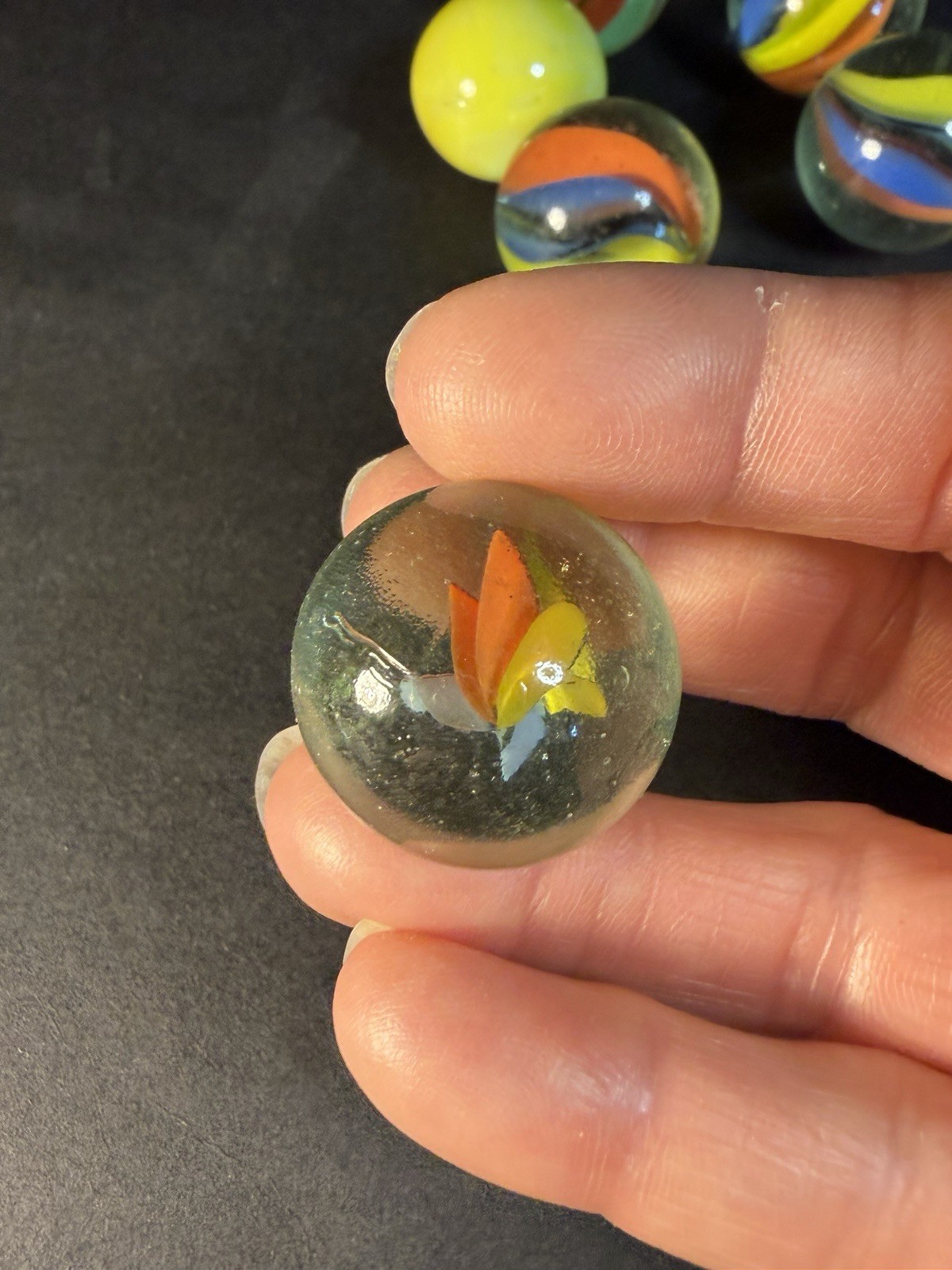 6 Cats Eye 1” Shooter Marbles Plus Two Other Solid Color Marbles