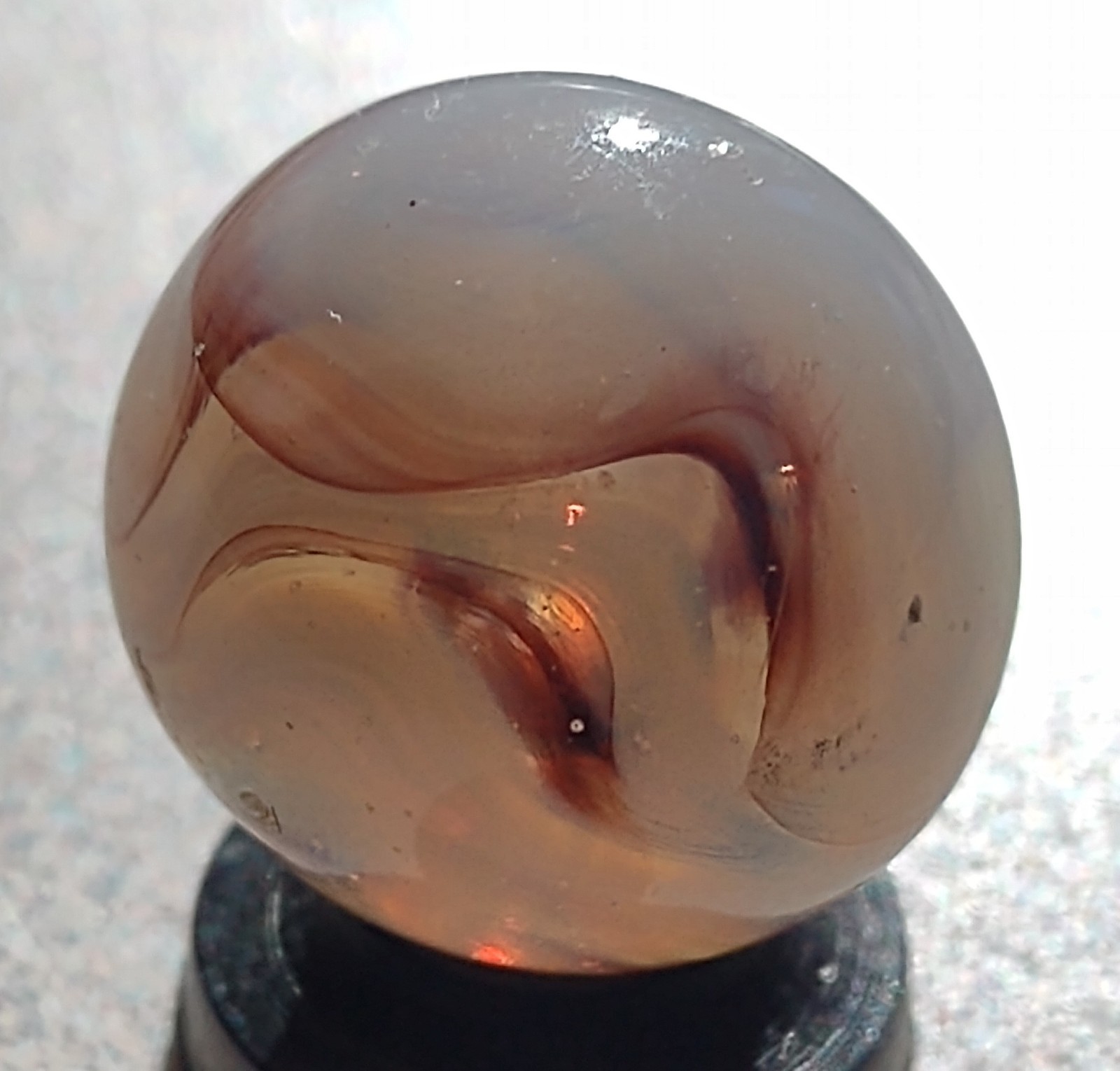 Transluc. Heaton Swirl marble-.64″+or-, OOR-Wispy interior, Purple streaks, N M