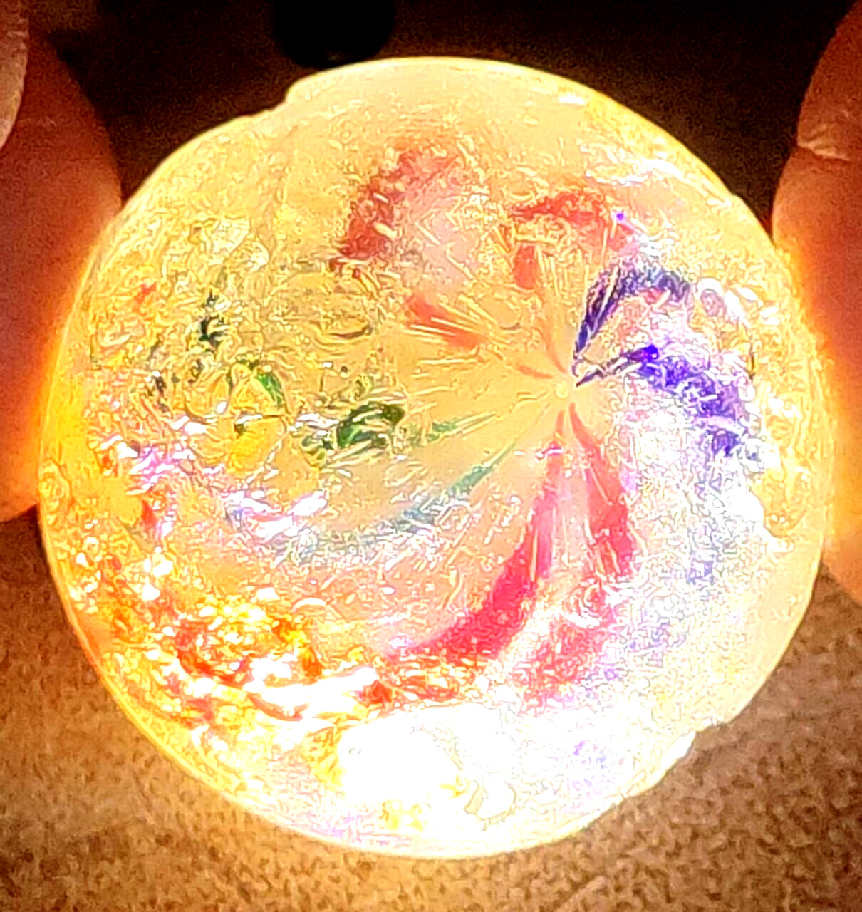 TOY MARBLE 1.1” marble trilevel ,solid core, 4 panel ribbon swirl, requ ground