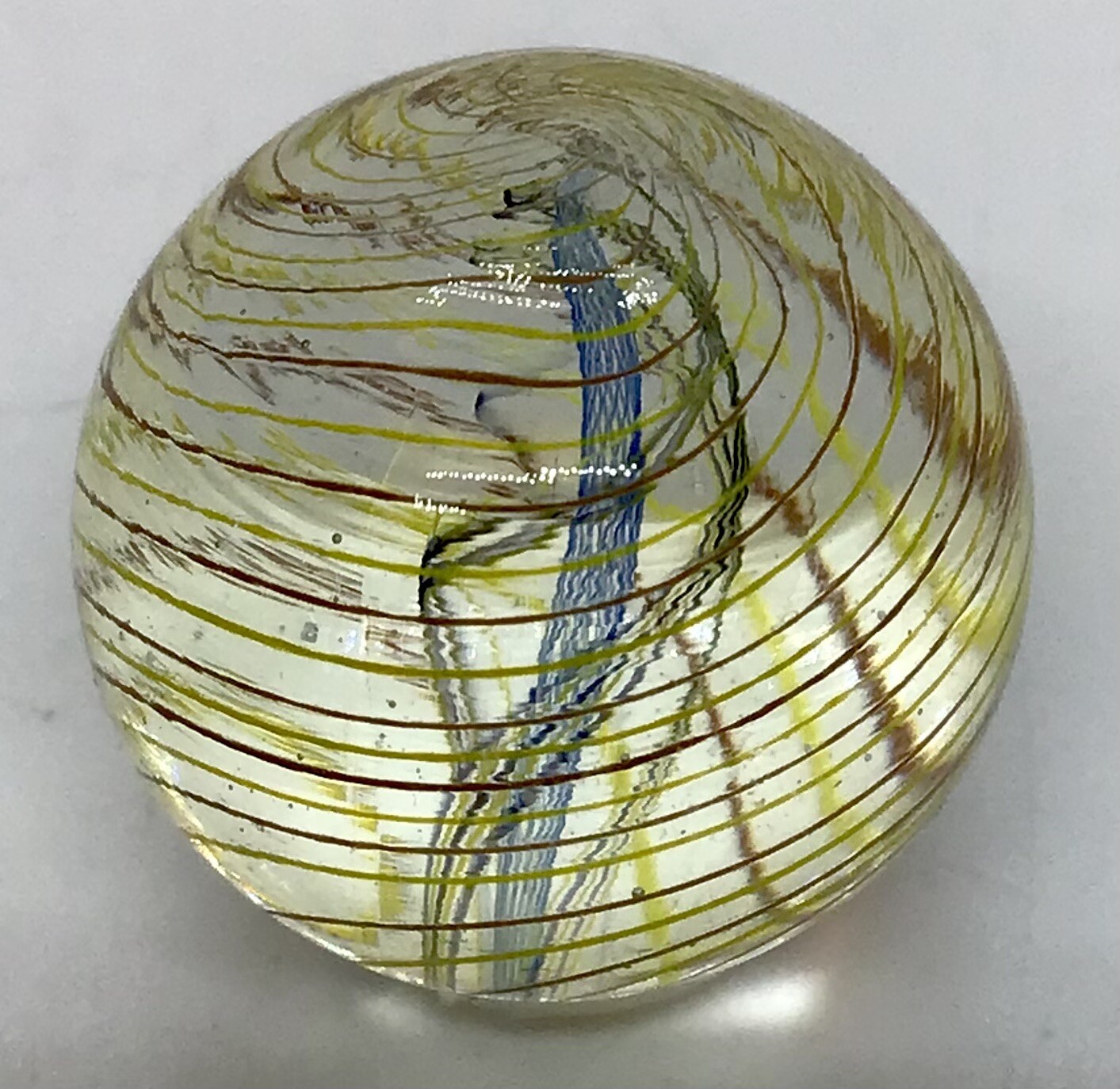Contemporary Divided Ribbon core marble. It measures .88” in mint condition.