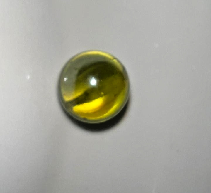 21 vintage handmade glass marbles with colorful swirls and unique patterns.