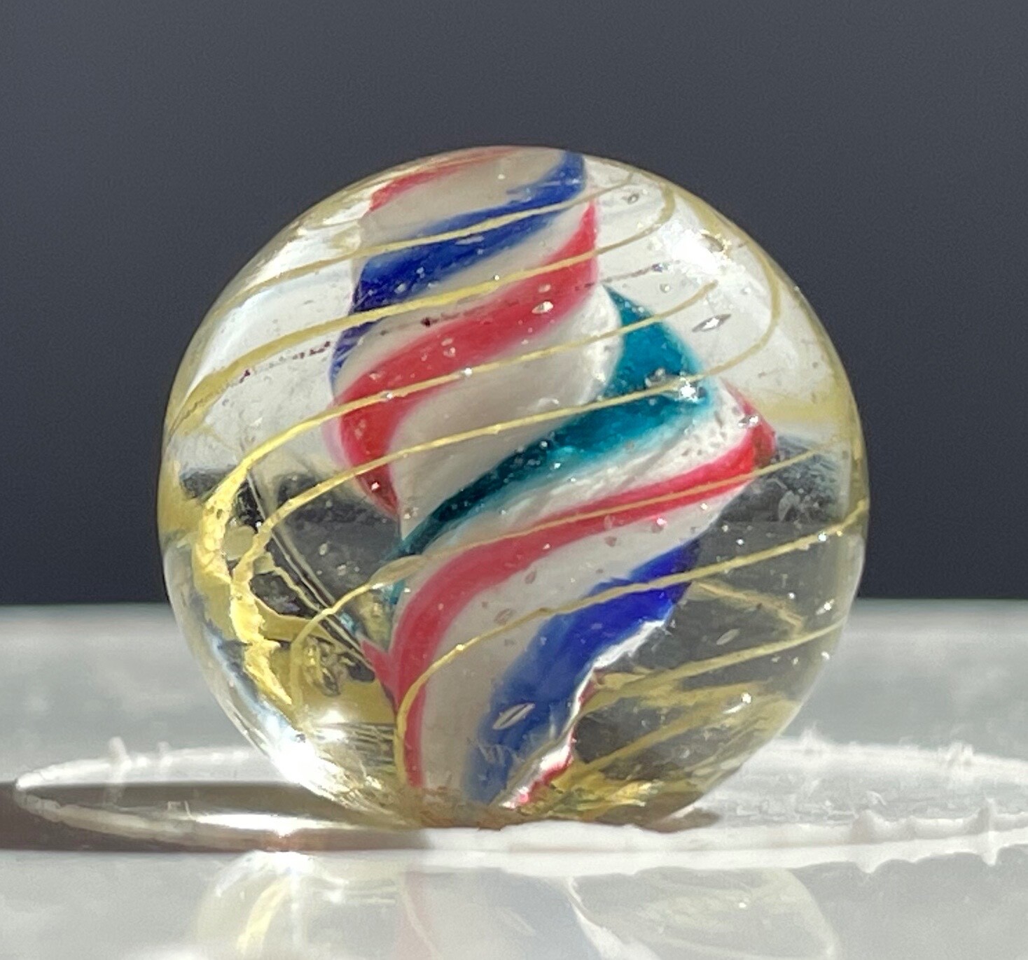 Twisting Red/Blue/Green On A Solid White Core Marble 16mm (5/8”)