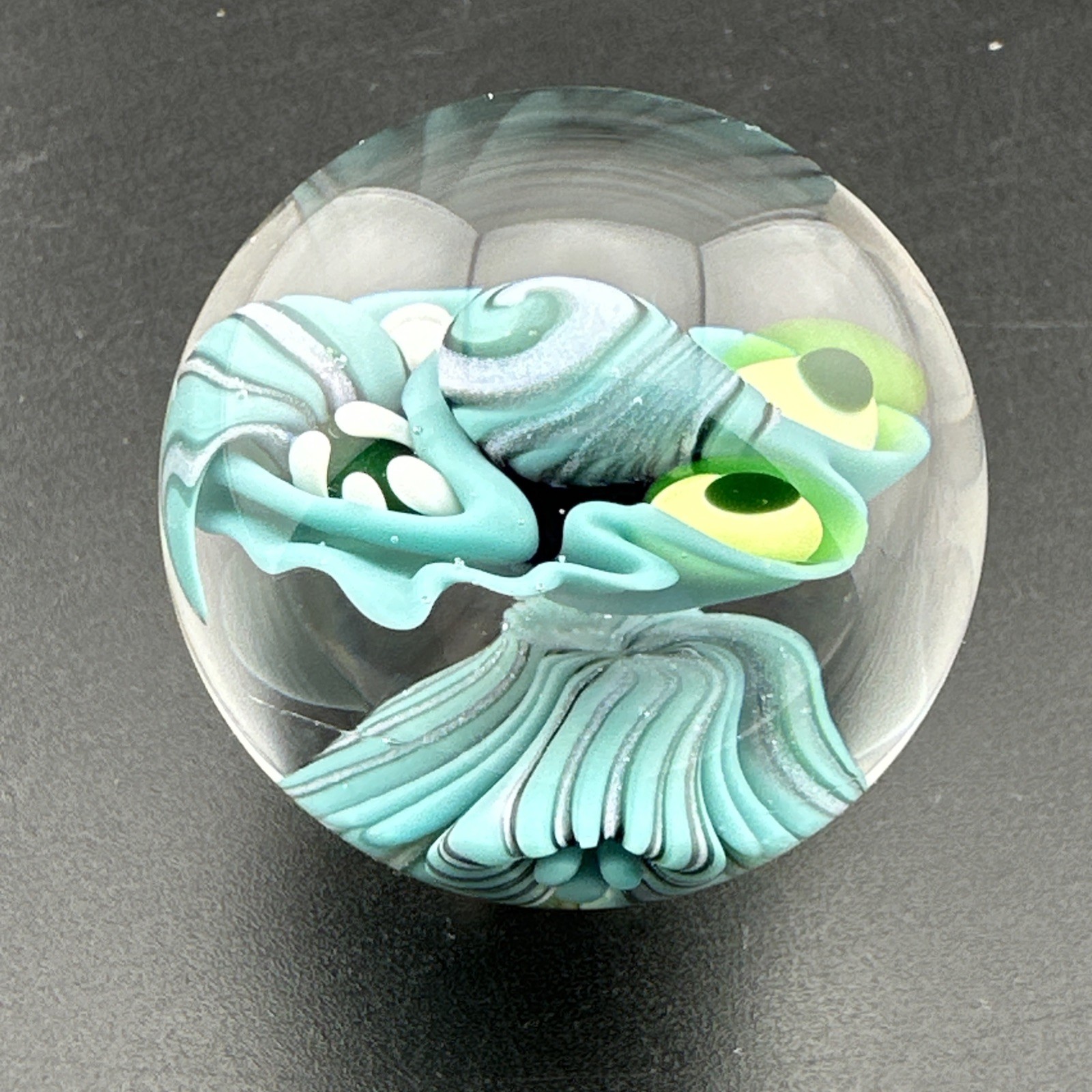 Contemporary Handmade Art Glass Marble 1.46″ Blue Monster, Flower, + UV Glow!