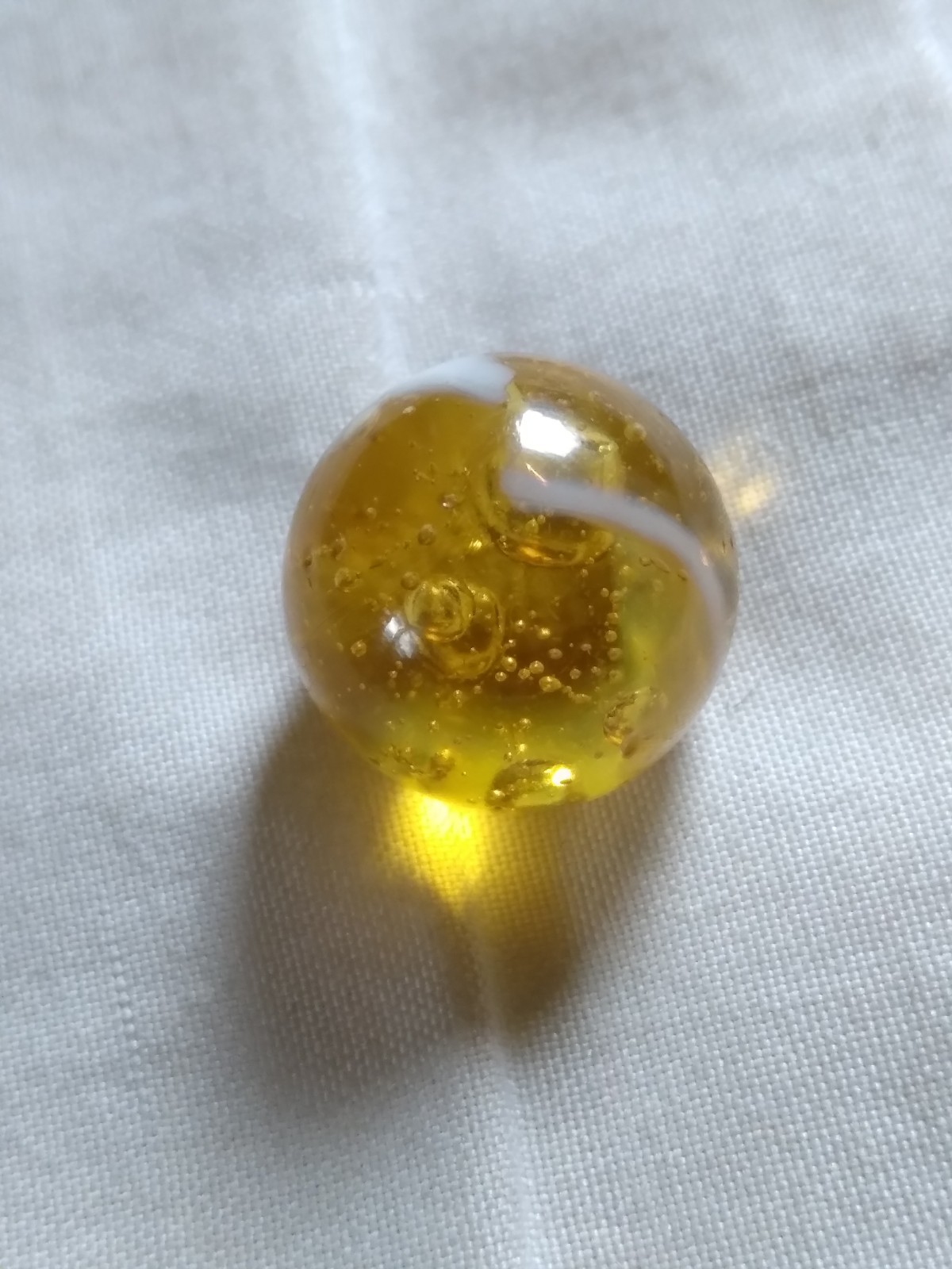 Vintage 9/16″ Yellow Glass Playing Marble.