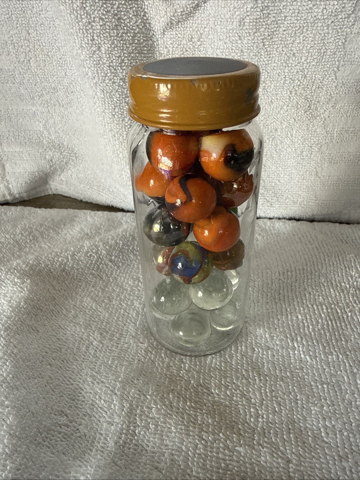 A Jar Of 24 Marbles Including The Jar, Which Is Kind Of Cool Looking!