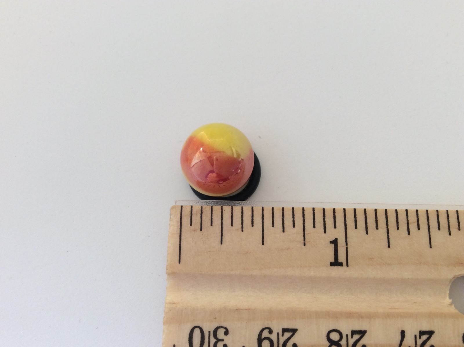 Mega Marbles Sun Peewee 1/2″ Iridescent Red/ Yellow Marble Buy 1/More UV Blcklgt