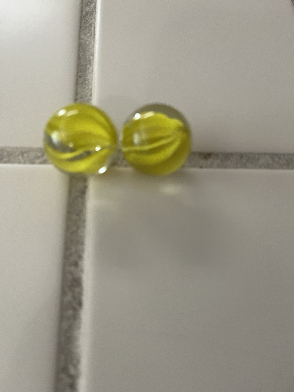 Two Vintage Vitro Agate Caged Cats Eye Shooter Marbles