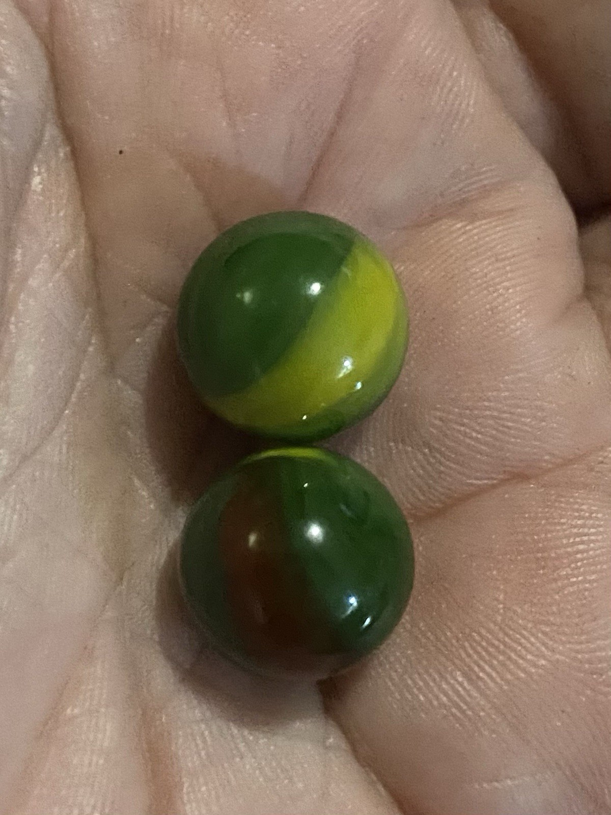 Two Green Red Yellow Pee Wee Marbles
