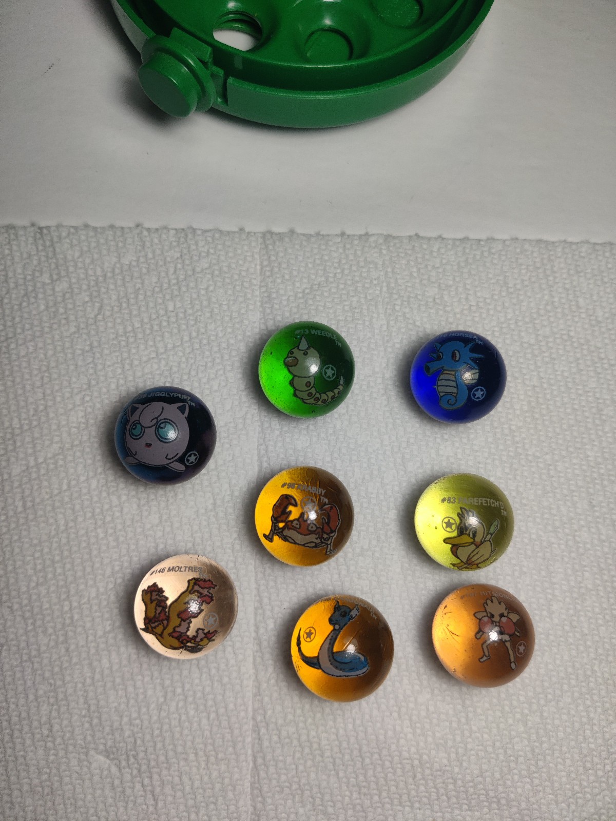 Lot of 8 First 1st Edition Star Pokemon Marbles w #76 Golum Bag #104 Cubone case