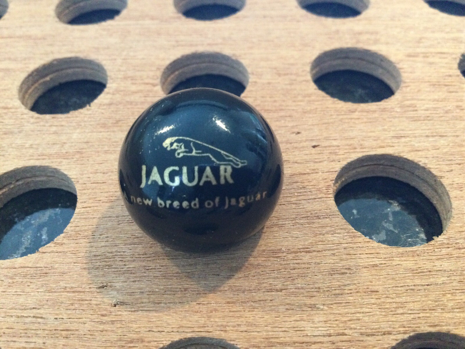 Vintage | “Jaguar A New Breed of Jaguar” | Gold & Black Marble