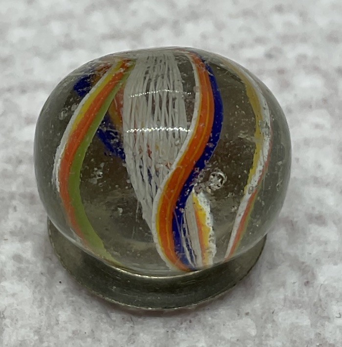 German Handmade Polished White Latticinio Marble. Measures .61” Good Condition.
