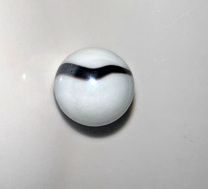 21 vintage handmade glass marbles with colorful swirls and unique patterns.