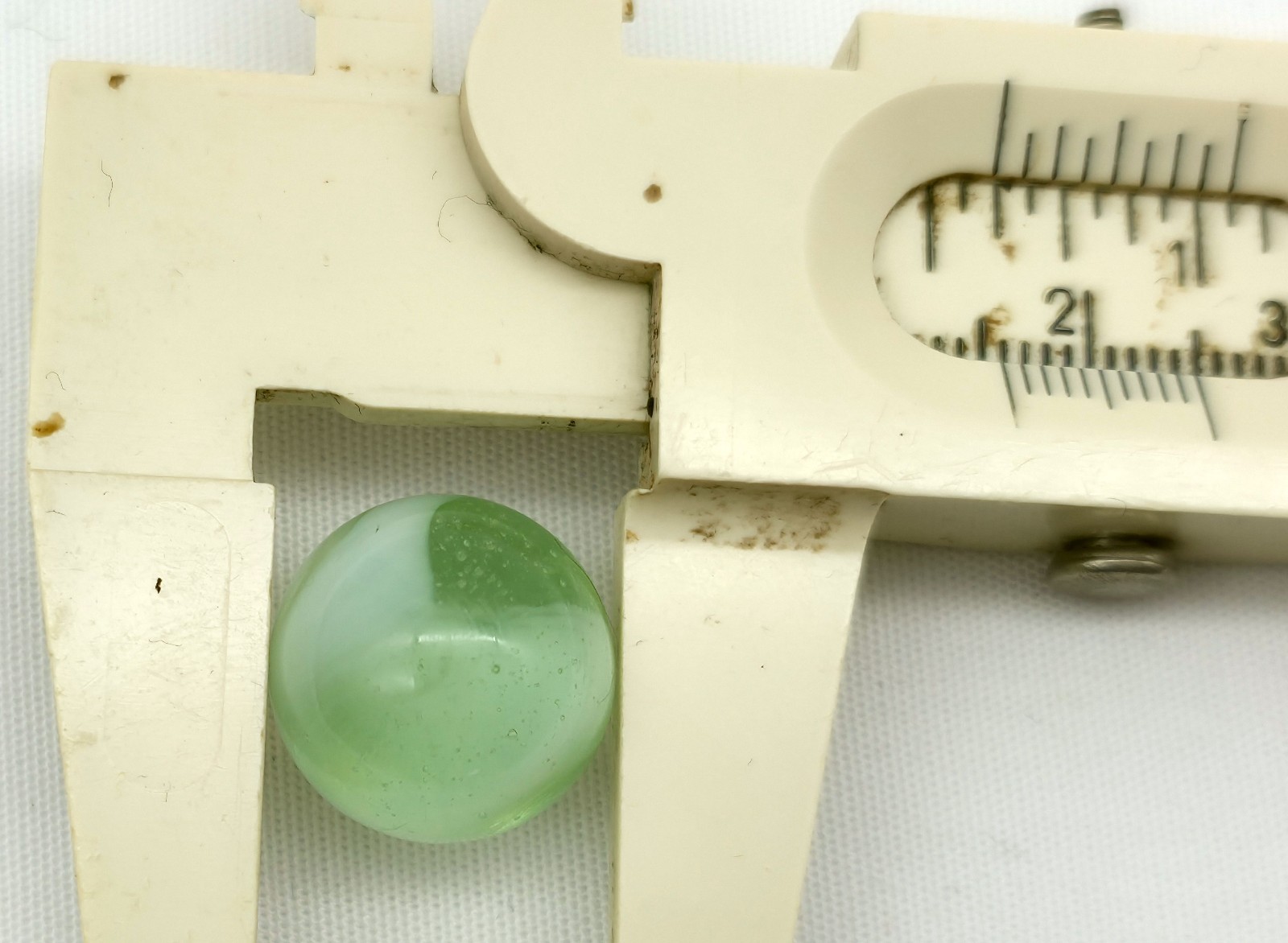 Pale Green Vaseline Old Machine-Made Marble Glows under a Blacklight 5/8”