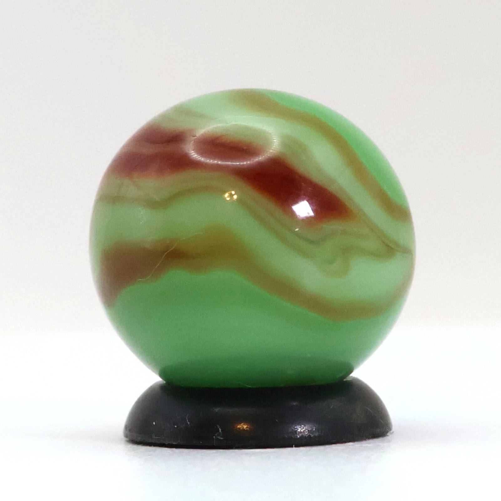5/8″ Swirl Marble Green Base with Tan & Red Ribbons M-
