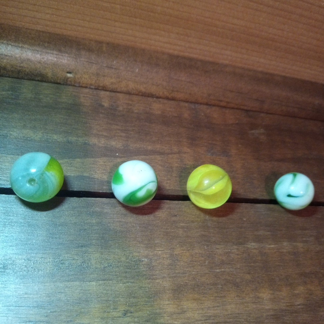 4 Vtg Uranium Glass Swirl Shooters Marbles UV Reactive Blacklight Glow Vaseline