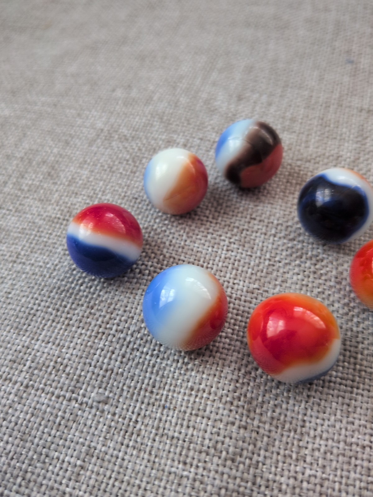 Vintage Marbles Lot Of 7 Red White Blue Brown Swirl Various Sizes